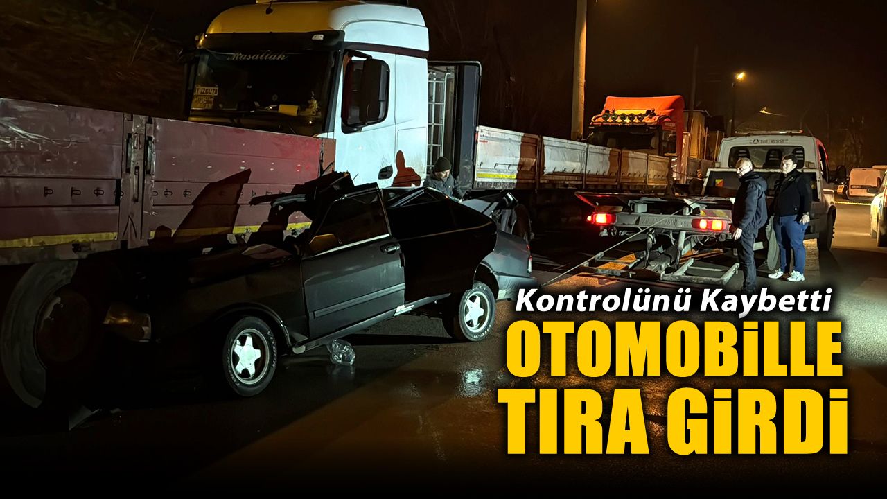 Parked truck struck by car, 2 injured.